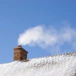 How Ice and Snow Cause Winter Roof Damage (and What to Do About It)