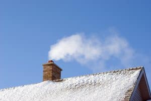 Read more about the article How Ice and Snow Cause Winter Roof Damage (and What to Do About It)